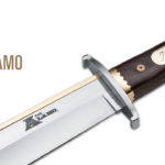 A close-up image of a polished Bowie knife with a wooden handle engraved with ‘Jim Bowie,’ featuring ‘The Alamo’ logo on the blade and text reading ‘The Alamo: Case Study’ on a clean white background.