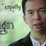 Close-up of a person speaking, with the words ‘empathy’ and ‘design’ handwritten in a creative style overlaying the background