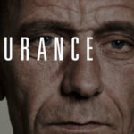 Portrait of a middle-aged man with a serious expression, accompanied by the text ‘ENDURANCE’ displayed across the image.