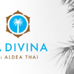 LaDivina at Aldea Thai - Logo of La Divina at Aldea Thai, featuring a palm tree emblem with a serene Buddha statue and palm leaves in the background