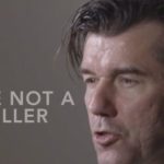 Close-up of a man speaking passionately with text overlay: ‘YOU ARE NOT A STORYTELLER’ in bold white font