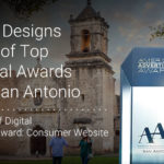 J 12 Designs Part of Top Digital Awards for San Antonio - This image highlights J 12 Designs receiving recognition at the American Advertising Awards in San Antonio. The accolades include the "Best of Digital" and the "Gold Award: Consumer Website," showcasing their excellence in digital design and innovation within the local market. The backdrop features a historic site, emphasizing the blend of tradition and modern creativity.