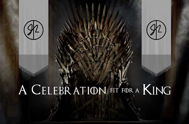 A Celebration fit for a King - This image highlights a majestic "Game of Thrones" inspired theme, featuring the iconic Iron Throne at the center, surrounded by banners bearing the "J12" logo. The text reads, "A Celebration Fit for a King," using a regal font style that evokes the grandeur and drama of a medieval fantasy setting. The dark and moody atmosphere, with the glowing throne as the focal point, creates a striking visual that complements the theme of power and royalty